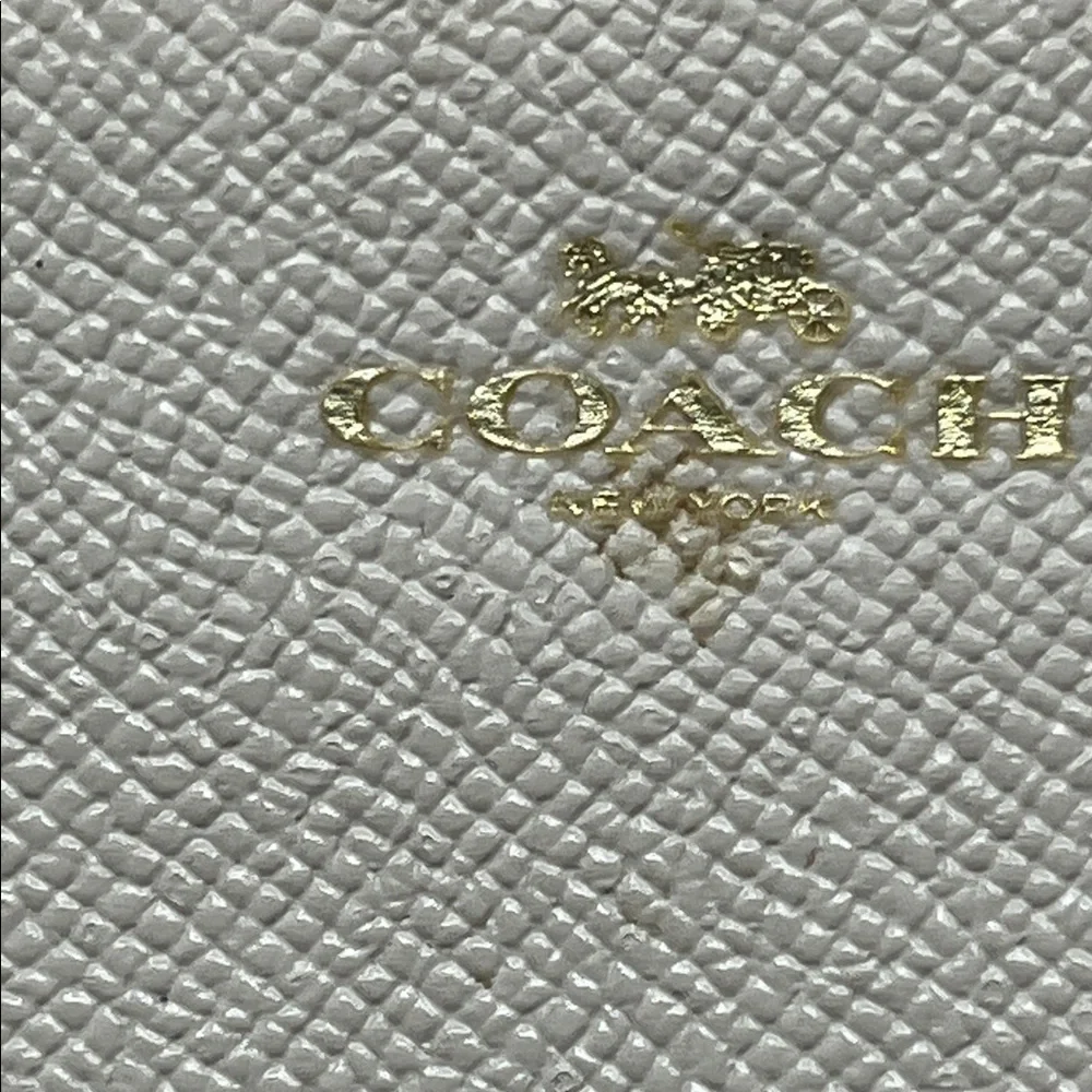 Coach Small Ivory Textured Leather Wristlet